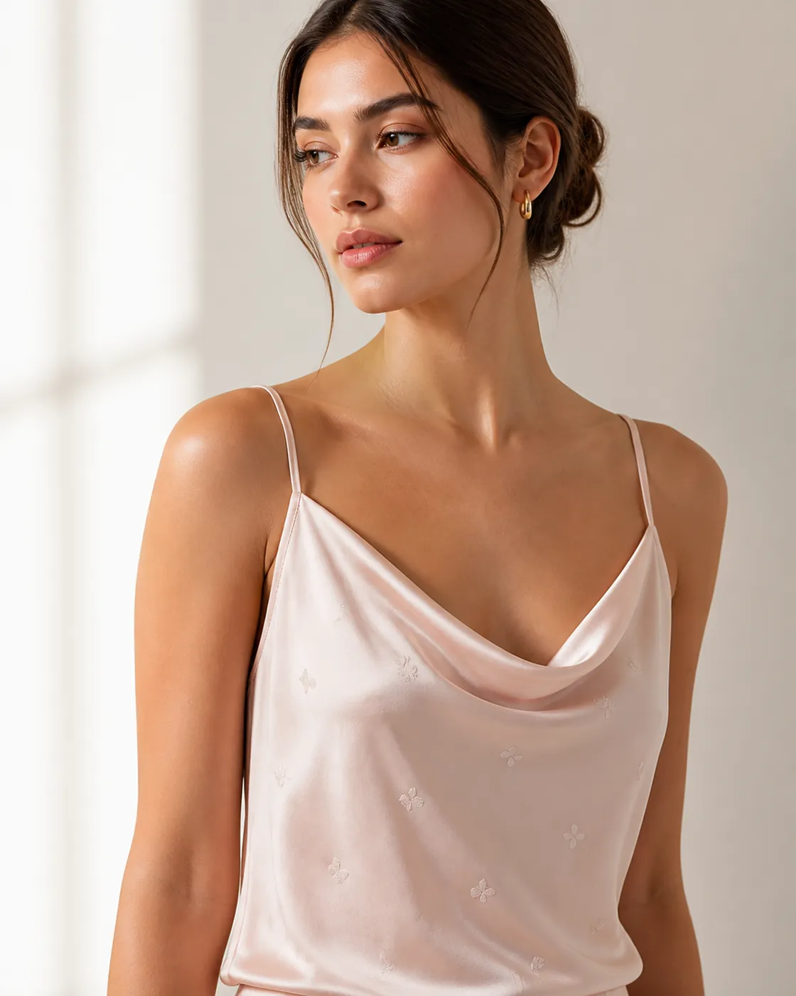 Blush satin camisole apparel sample on model