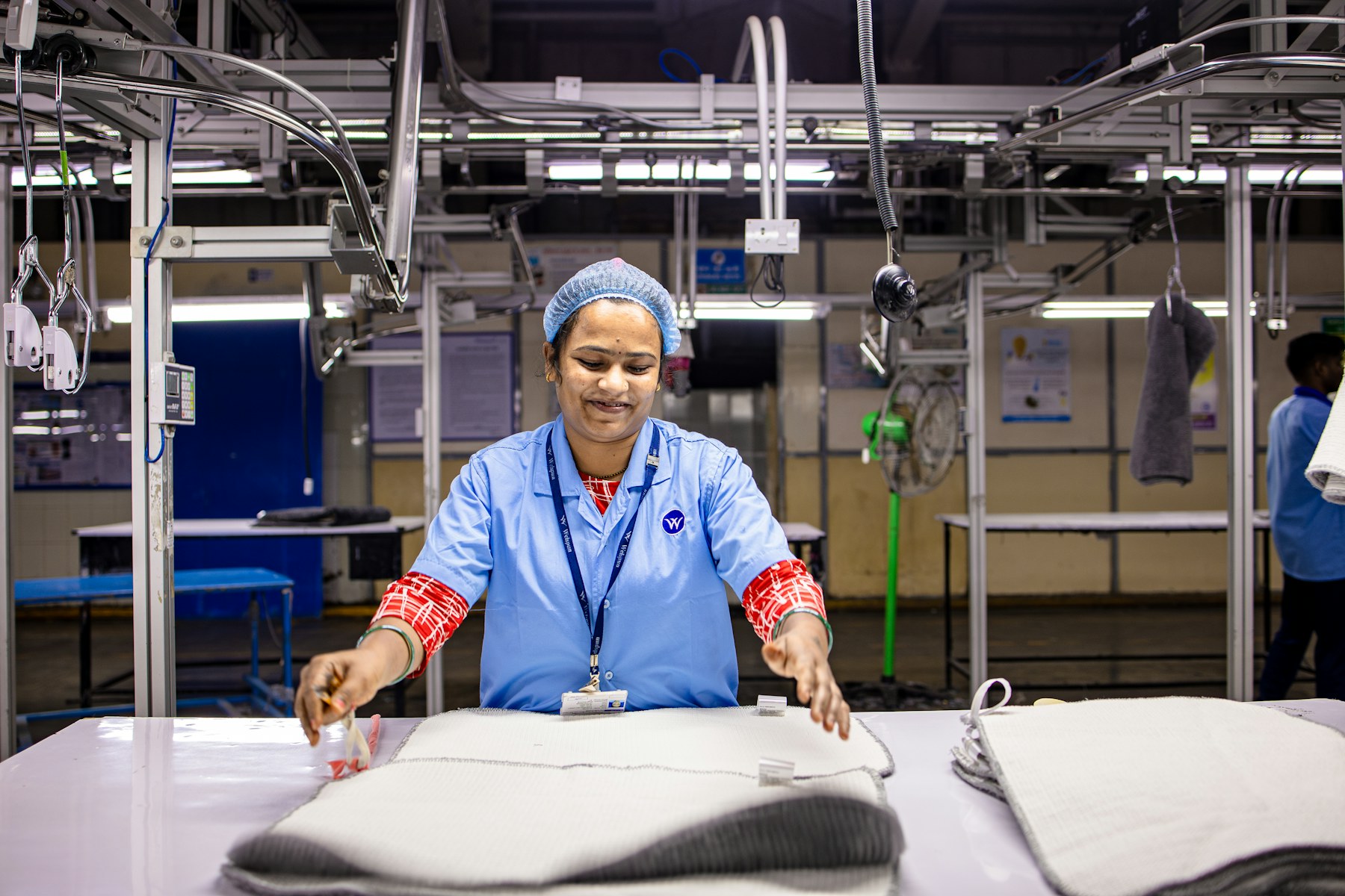 Garment factory quality control inspection on a production line